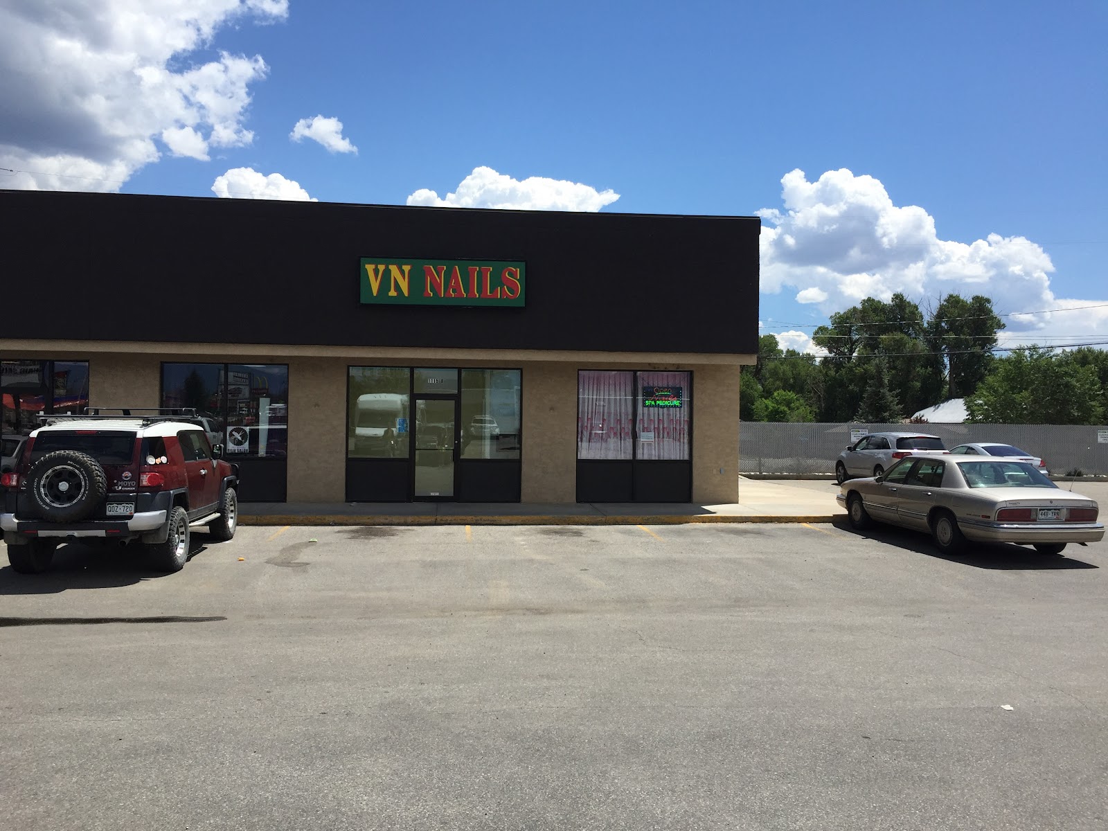 V N Nail Salon logo